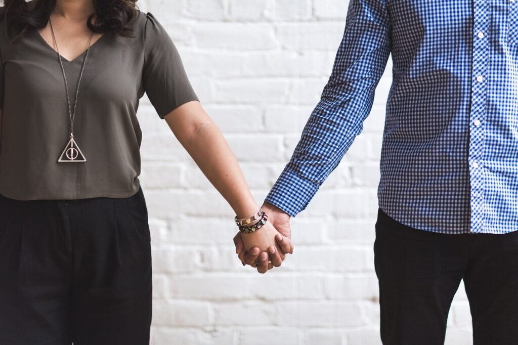 Cultivating a Healthy Relationship with What’s to Come, couple, together, holding hands