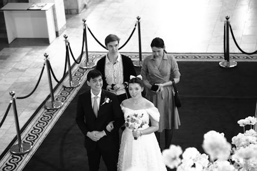 A bride and groom at an elegant wedding ceremony in Kyrgyzstan, capturing a moment of joy.