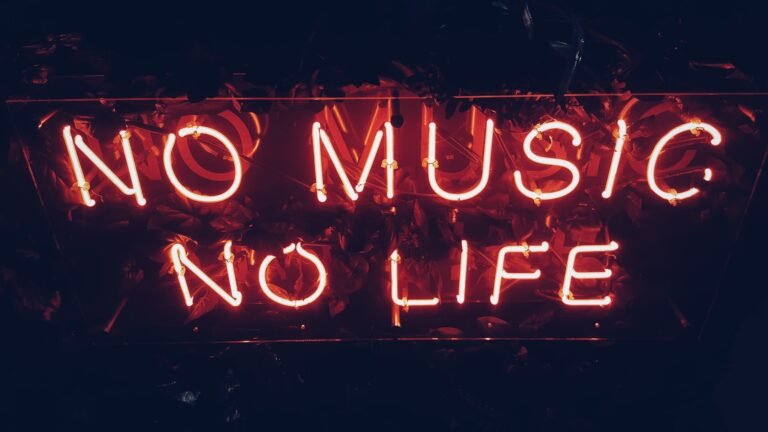 "Love in Music: How Romance Shapes Songs, Emotions, and Culture Through the Ages"(red no music no life signage)