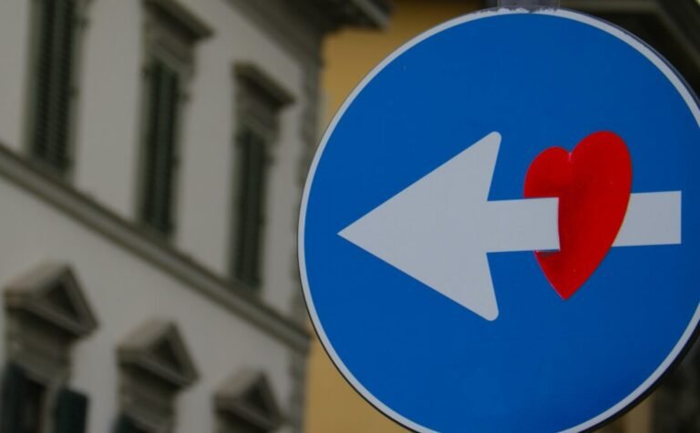 Love and health Future:- Why is it important to be healthy?.white arrow through red heart road signage