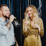 Love and Life Beyond 45: Embracing Romance, Growth, and Wisdom.(Two adults celebrating with champagne in a festive setting, smiling and enjoying the moment.)