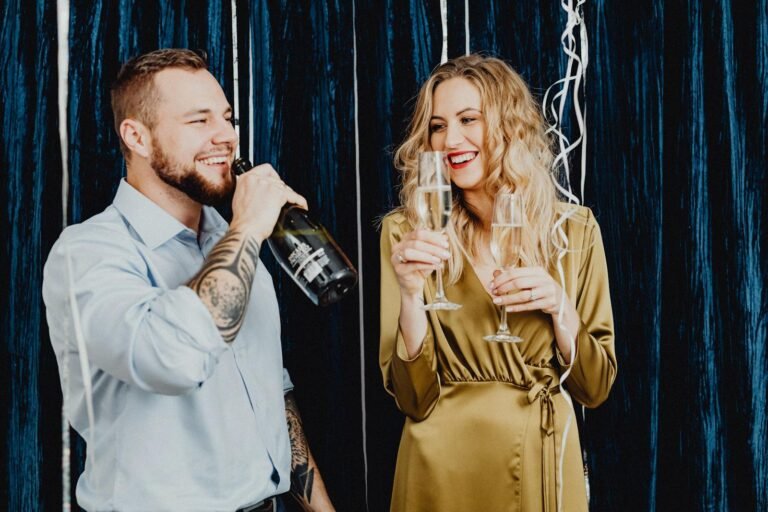 Love and Life Beyond 45: Embracing Romance, Growth, and Wisdom.(Two adults celebrating with champagne in a festive setting, smiling and enjoying the moment.)