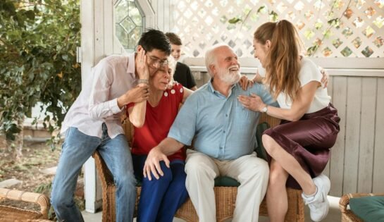 Love, Health, and Happiness: Unlocking the True Secret to a Fulfilling Life in 2025. Cheerful family spending quality time together outdoors, showcasing love and connection.