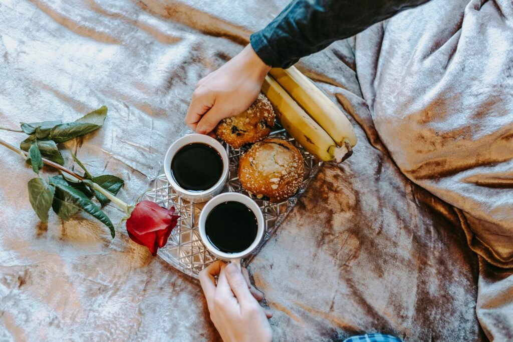 The Tapestry of Love and Sex: A Vital Thread in the Human Experience in 2025. 2 The Tapestry of Love and Sex: A Vital Thread in the Human Experience in 2025.(A cozy breakfast tray with coffee, muffins, bananas, and a rose on a bed.)