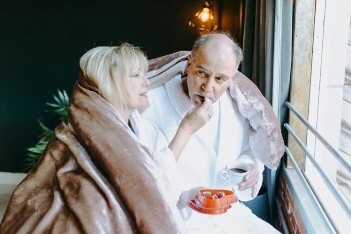 The Tapestry of Love and Sex: A Vital Thread in the Human Experience in 2025. 1 The Tapestry of Love and Sex: A Vital Thread in the Human Experience in 2025.(Warm moment shared by a senior couple in bathrobes, enjoying chocolates and a beverage by the window.)