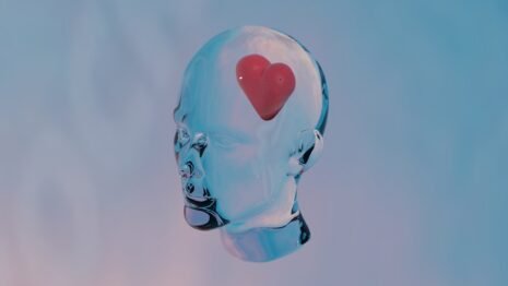 Love and Health Future: 7 Scientifically Proven Benefits of Loving Relationships in 2025..a glass head with a red heart in the middle of it