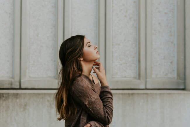 Part 2: Advanced Insights on Why Love Is Very Dangerous for Sensitive People.(woman in brown long-sleeved top standing beside wall)