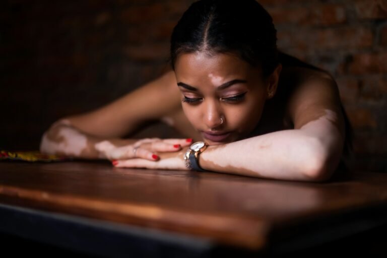 Loneliness in the Digital Age: Is AI the Antidote or an Amplifier? (Part 2) woman in red and white floral dress lying on brown wooden table