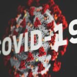 Love and Health: COVID-19 and Health in America.red white and black textile