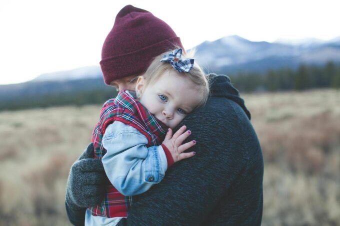 Love and Health: Father’s Day in US and Australia 2025 – Part 2 2 Love and Health: Father’s Day in US and Australia 2025 – Part 2 A father and child embrace outdoors with a winter mountain backdrop.