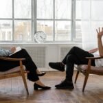 How To Balance Love: Mastering Relationships, Stress, and Health ,A therapist engaging in a counseling session with a male patient to support mental health.